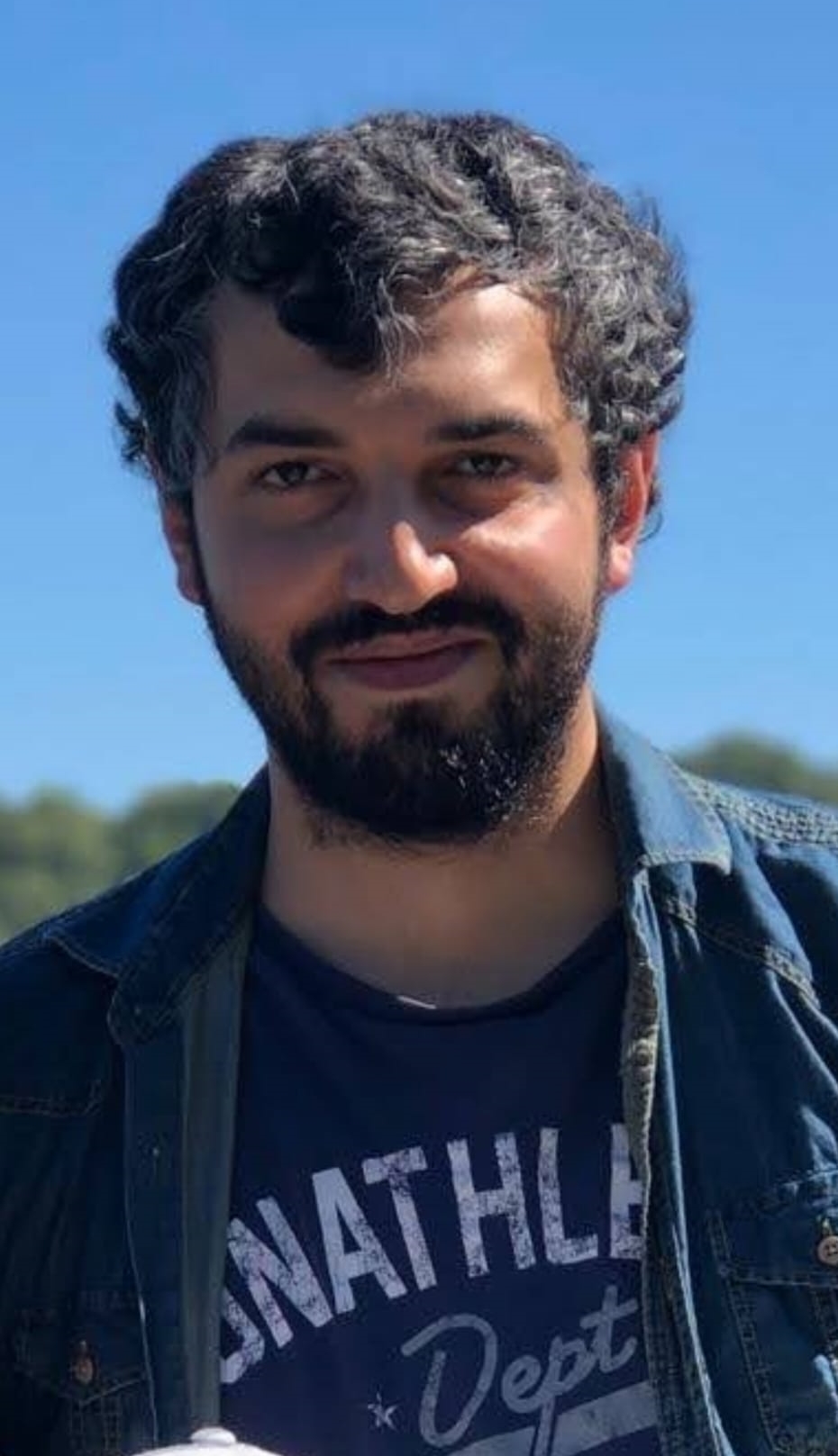 Headshot of Ekrem Ozkan.